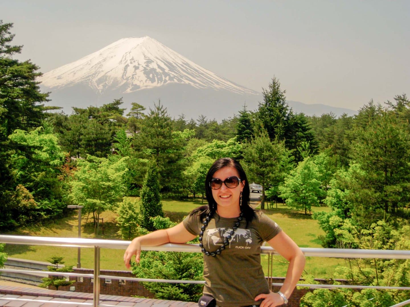 Girl standing with Mt. Fuji in the background in Japan.