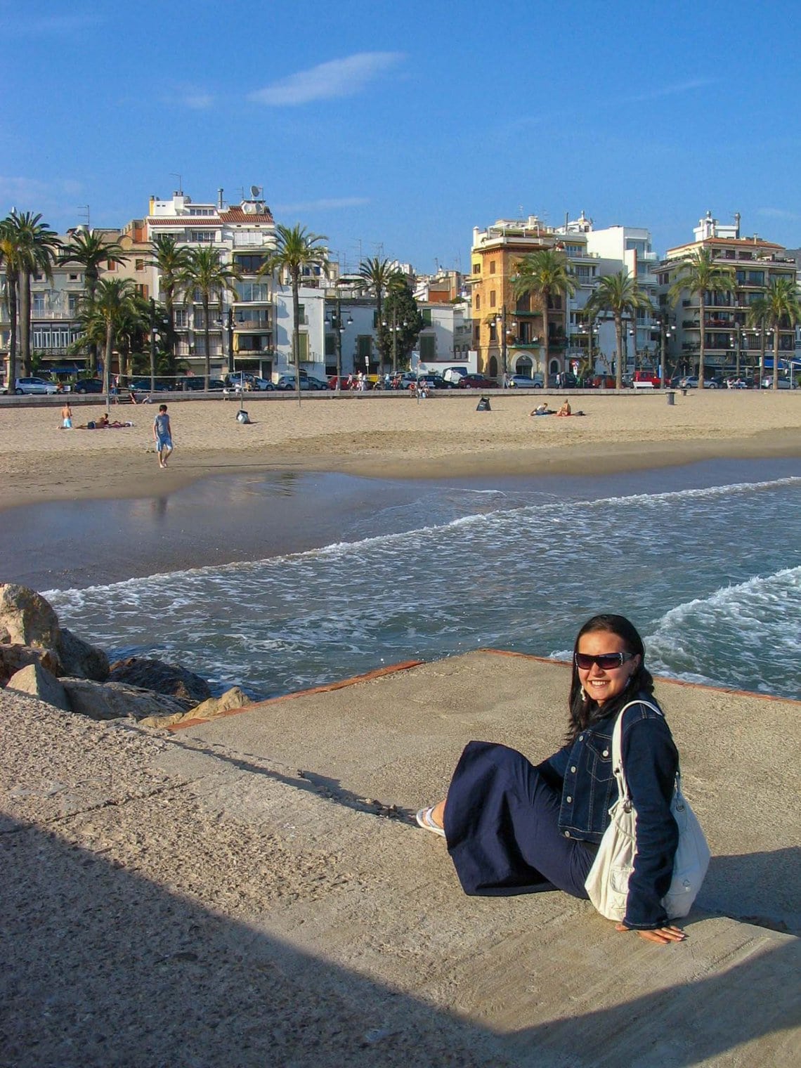 Girl on a beach in Sitges, Spain.