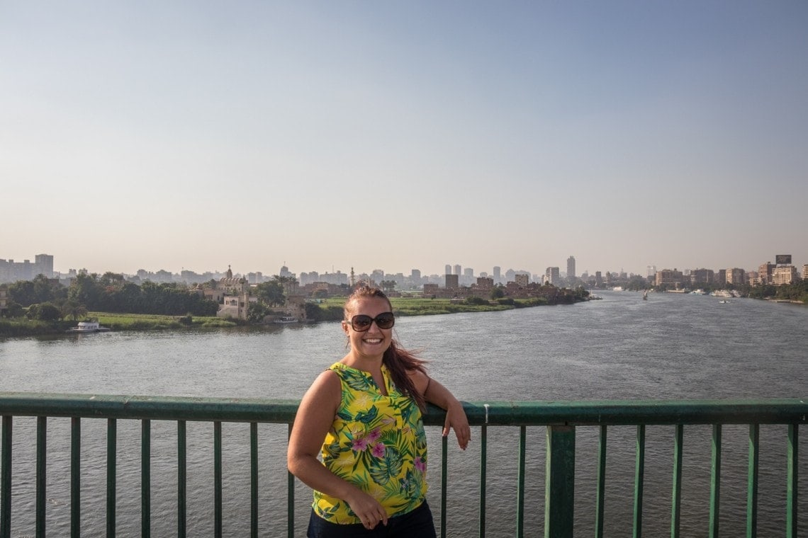 girl by the bridge above Nile River