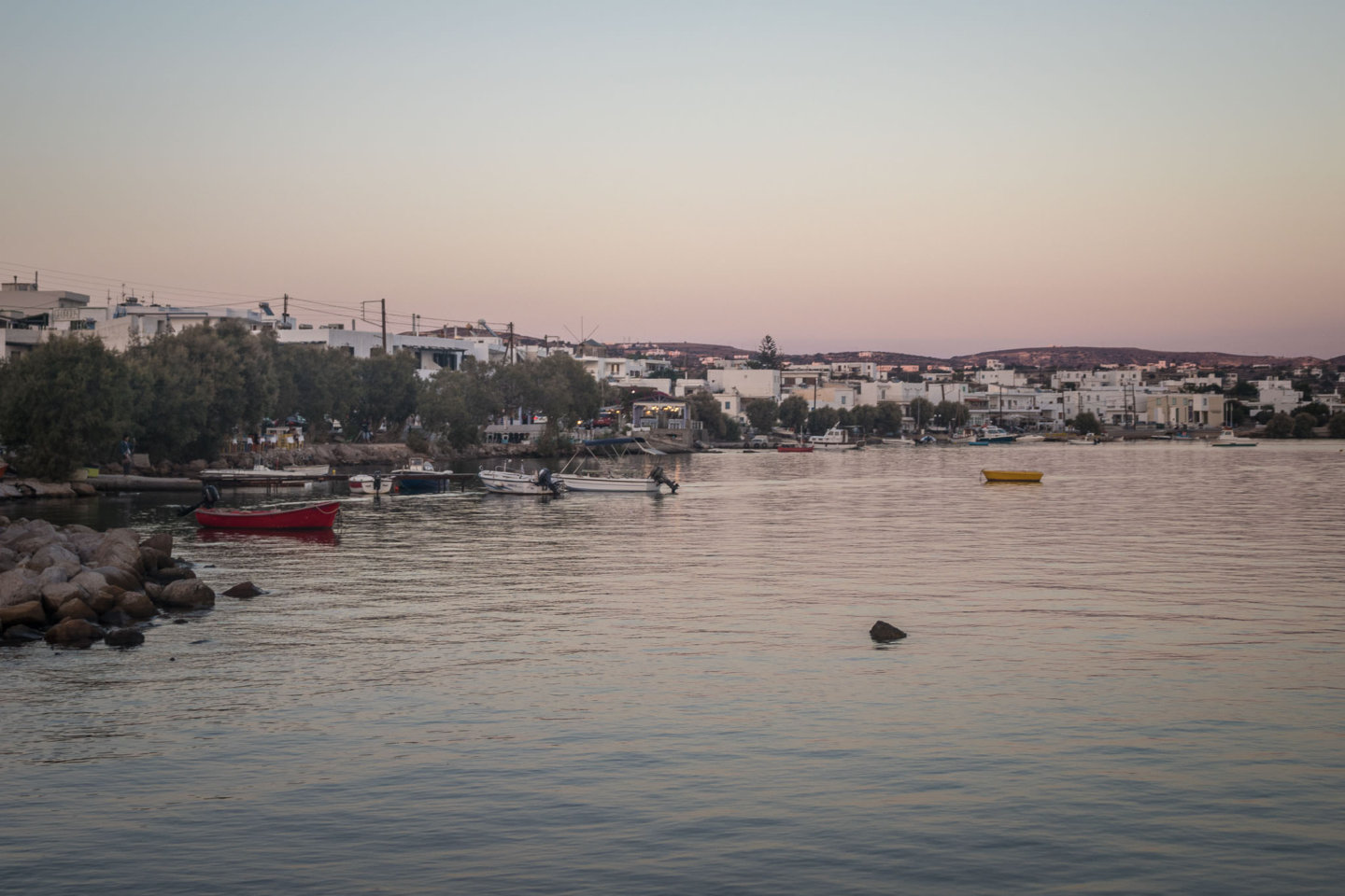 sunset over the Adamas port