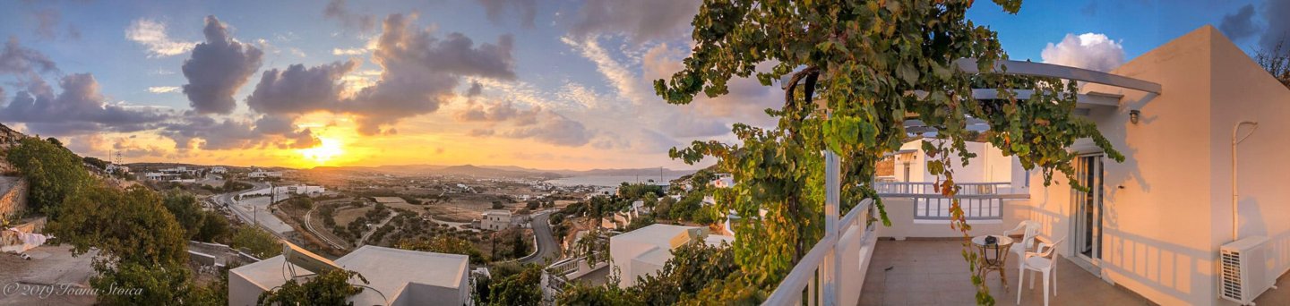 panoramic view of a sunrise from a balcony