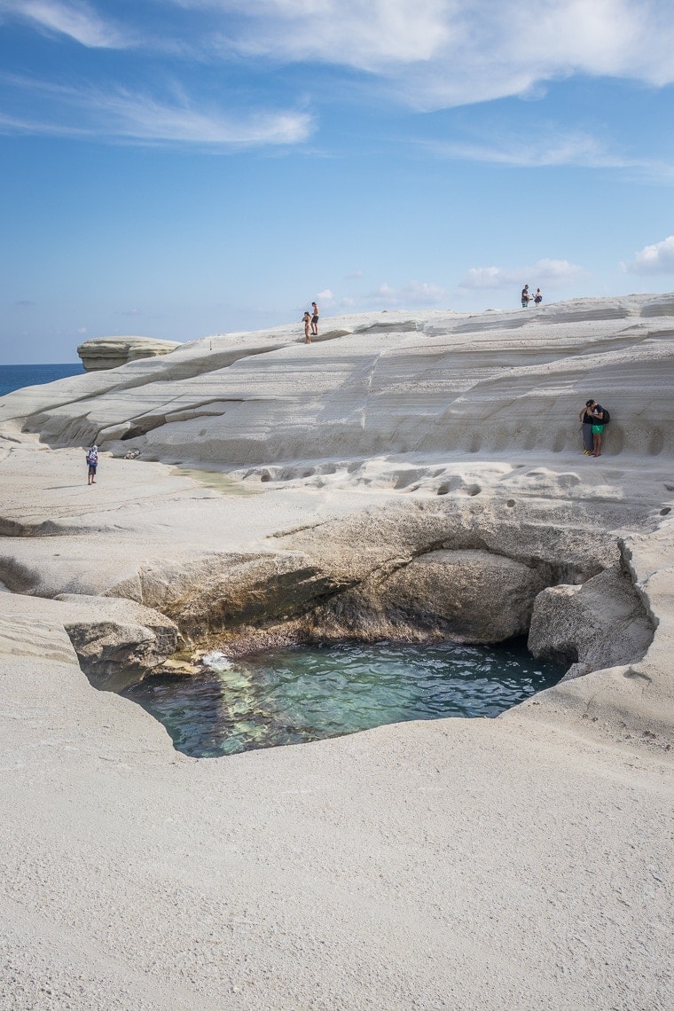 Sarakiniko beach rock formations and a cave