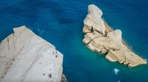 drone view of sunbathers at Sarakiniko