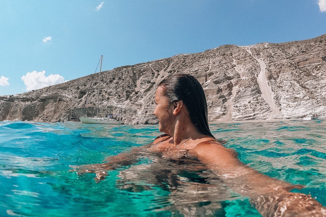 girl swimming in Gerontas beach, Milos island