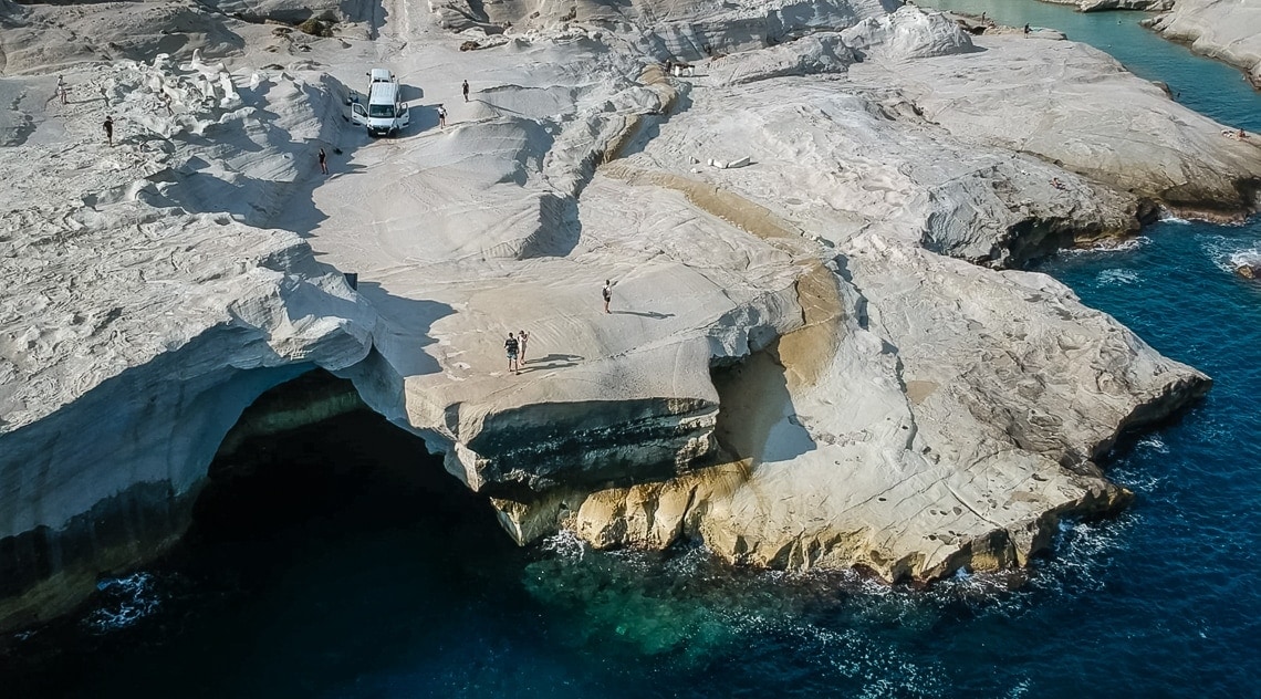 drone view of caves and rocks at Sarakiniko beach
