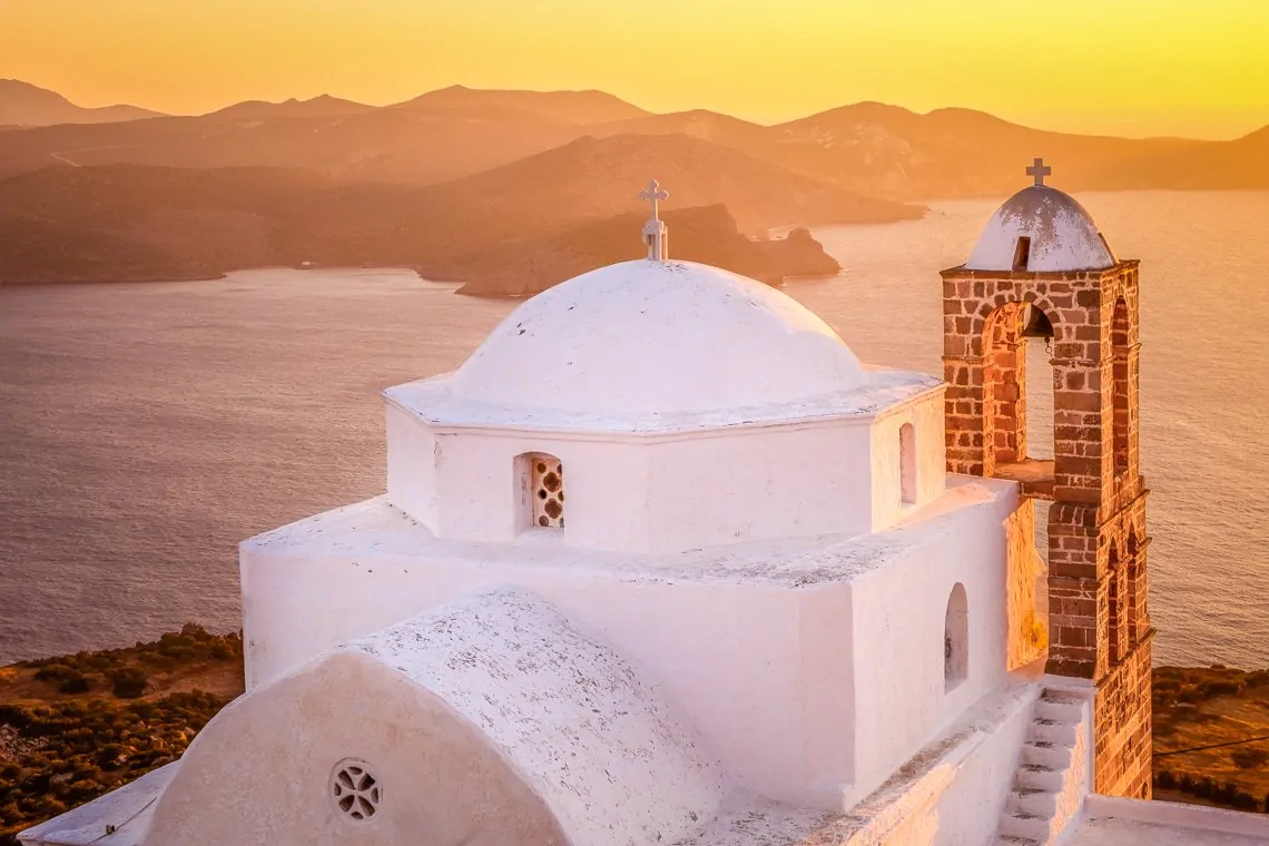 sunset over Milos bay seen from Milos castle