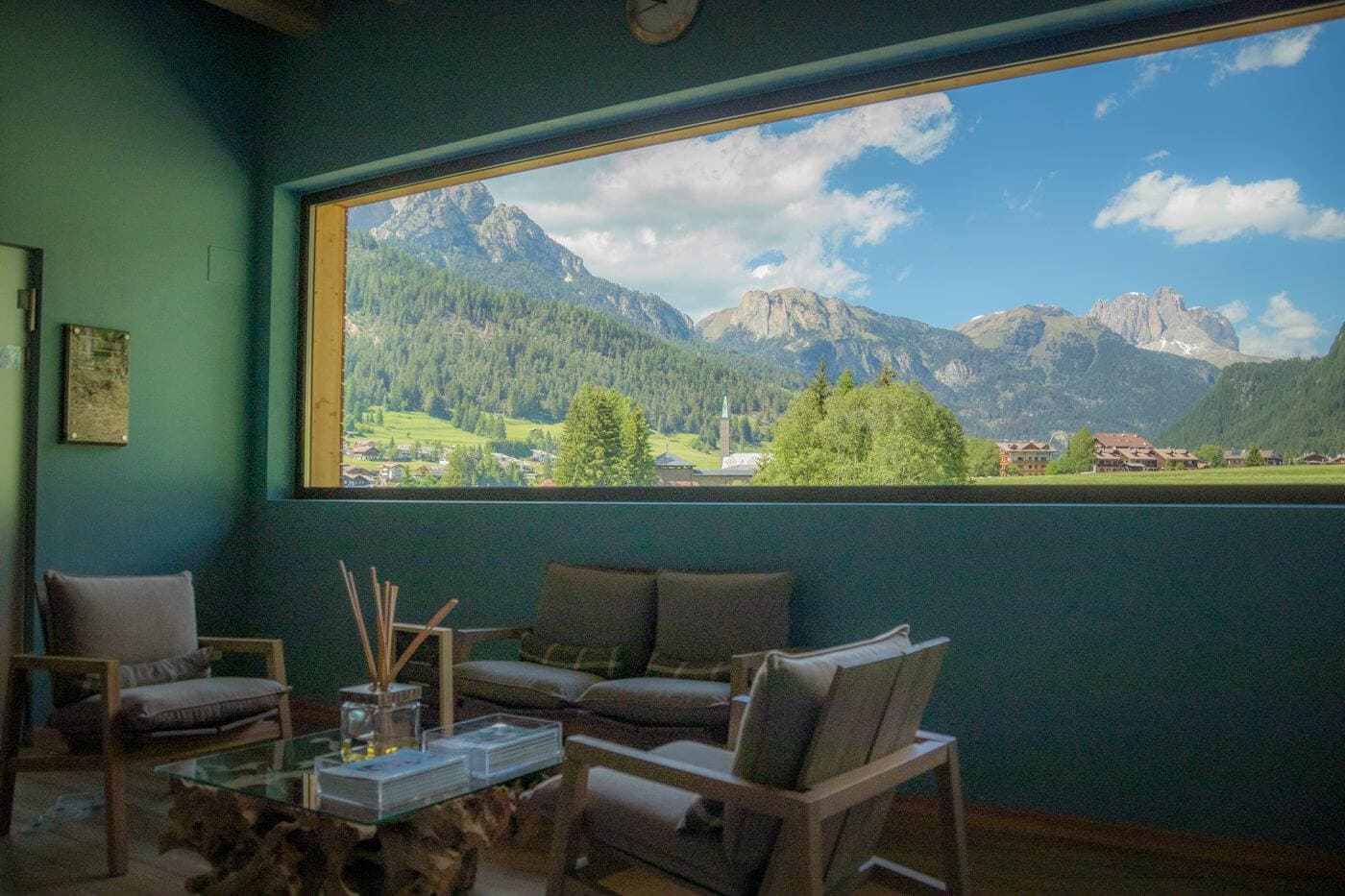 upstairs lobby at qc terme with a view of the dolomites in the trentino region
