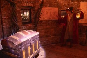 an actor alchemist introducing the escape room game